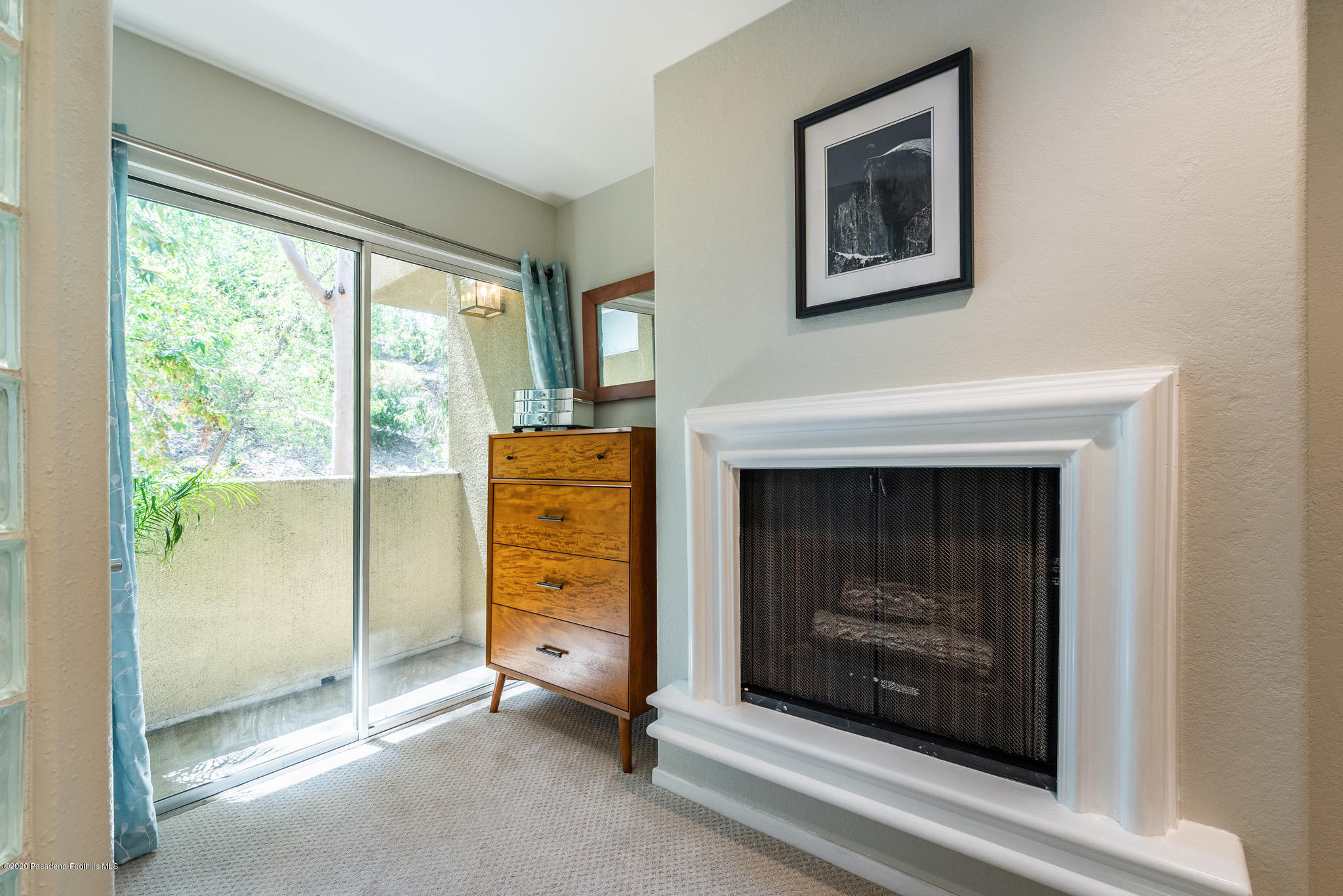 6140 Monterey Road, Unit 328 Los Angeles, CA 90042 - Photo 14 of 28 a view of an empty room with a fireplace