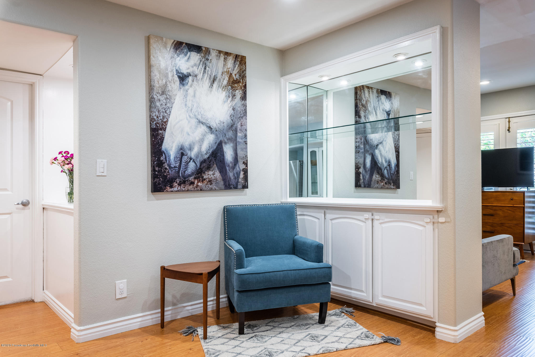 6140 Monterey Road, Unit 328 Los Angeles, CA 90042 - Photo 7 of 28 a living room with furniture and a painting on the wall