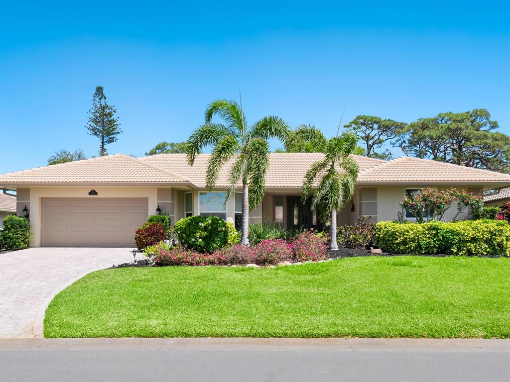 a view of a house with a garden