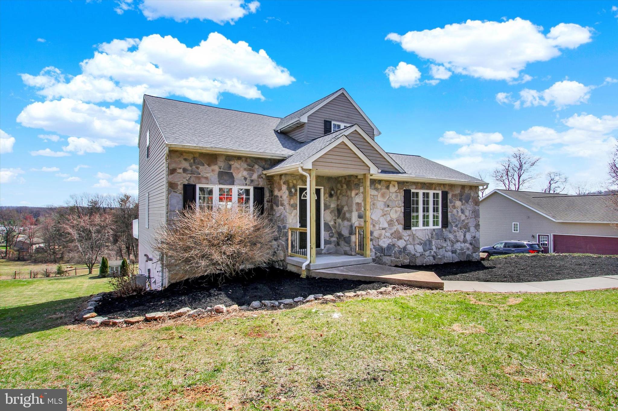 5086 Waltersdorff Road Spring Grove, PA 17362 - Photo 3 of 38 a front view of a house with a yard