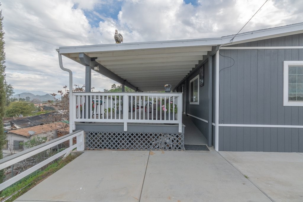 26460 Dale Street Hemet, CA 92545 - Photo 11 of 40 a view of a porch with wooden floor