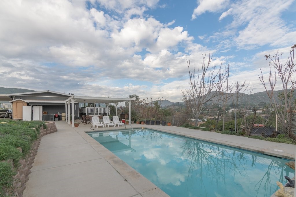 26460 Dale Street Hemet, CA 92545 - Photo 23 of 40 a view of a swimming pool with a patio