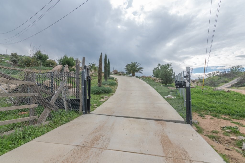 26460 Dale Street Hemet, CA 92545 - Photo 38 of 40 a view of a pathway with a wrought fence