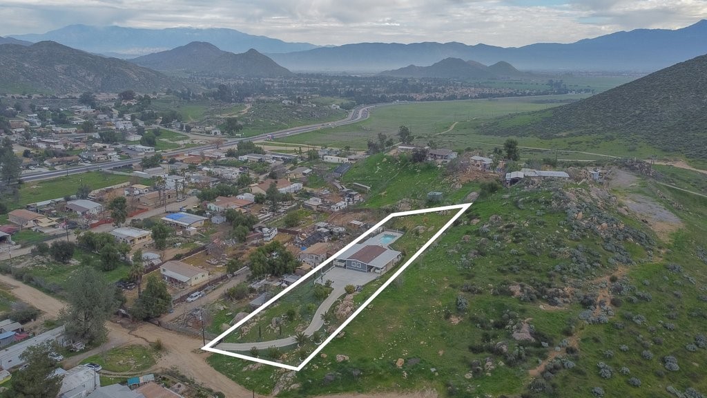 26460 Dale Street Hemet, CA 92545 - Photo 6 of 40 a view of a house with a mountain