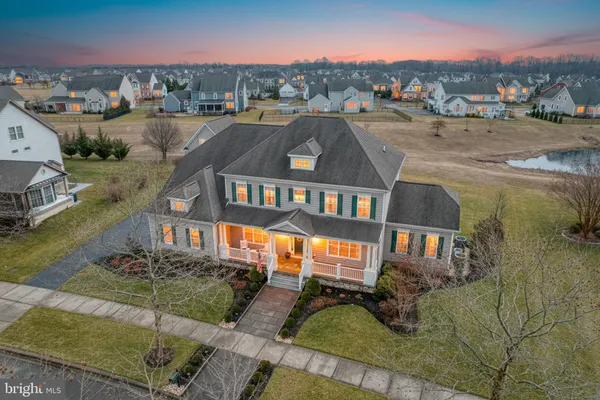 an aerial view of a house with a garden