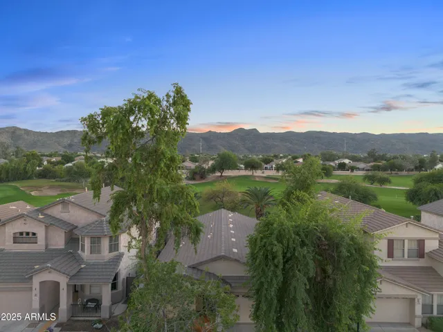 an aerial view of a house with a garden