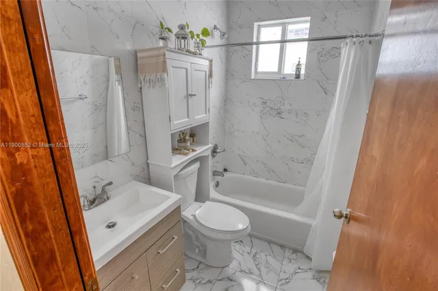 a view of front door with furniture