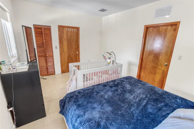 a view of a table and chairs in the garden