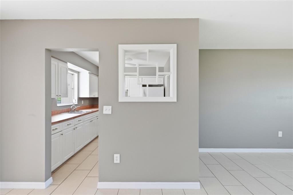 363 Glen Oak Road Venice, FL 34293 - Photo 18 of 53 a bathroom with a sink and a mirror