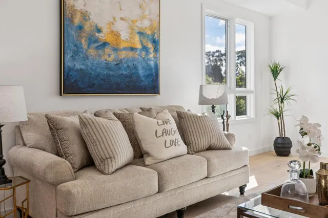 a living room with furniture and a couch