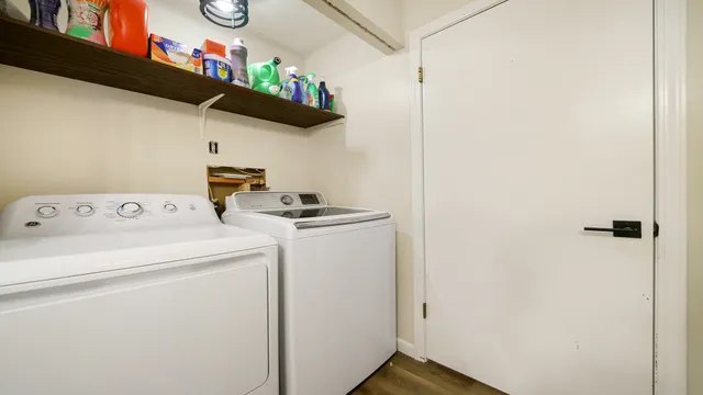 a utility room with dryer and washer