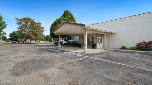 a backyard of a house with seating space