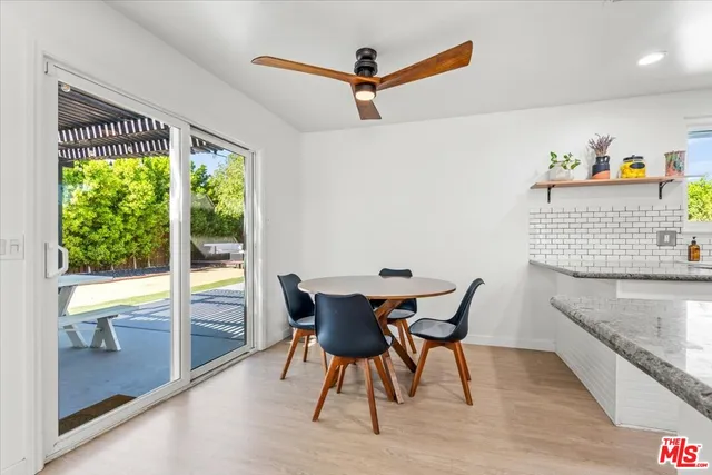 a utility room with sink dryer and washer