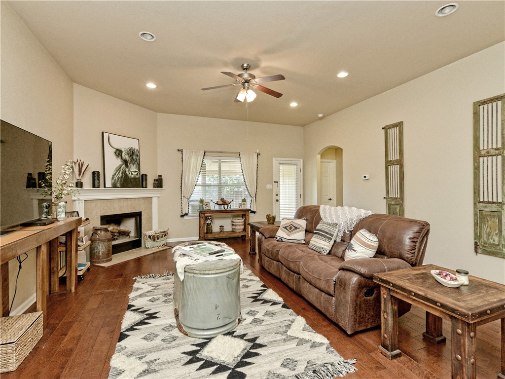 116 Barn Owl Loop Leander, TX 78641 - Photo 5 of 24 Great Room with warming fireplace