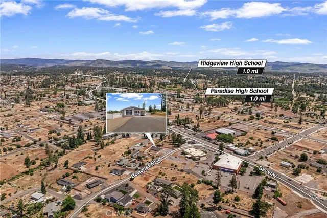 a picture of a bathroom with a white wall