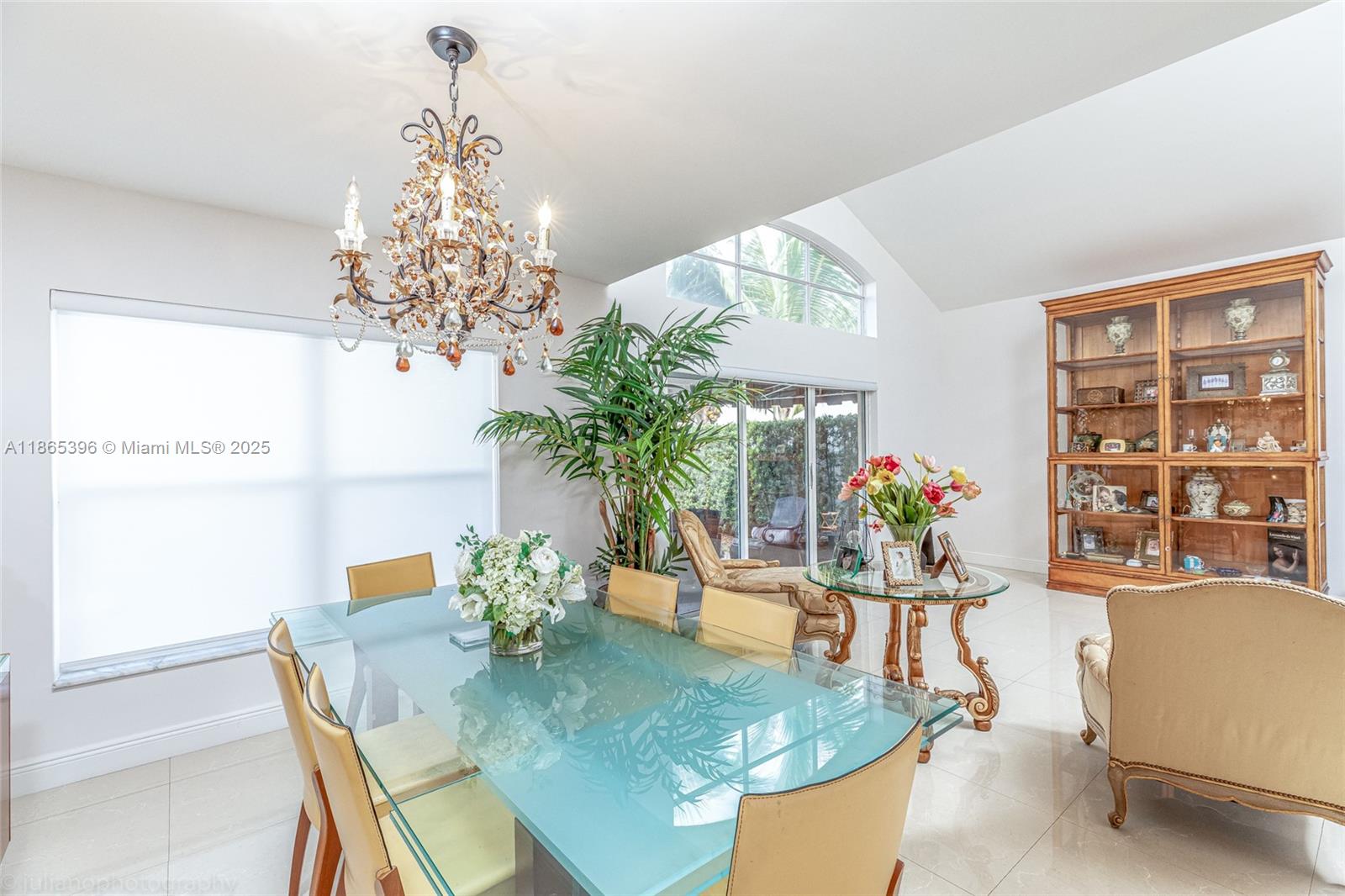 4913 Southwest 32nd Way Hollywood, FL 33312 - Photo 11 of 27 a dining room with furniture a chandelier and window