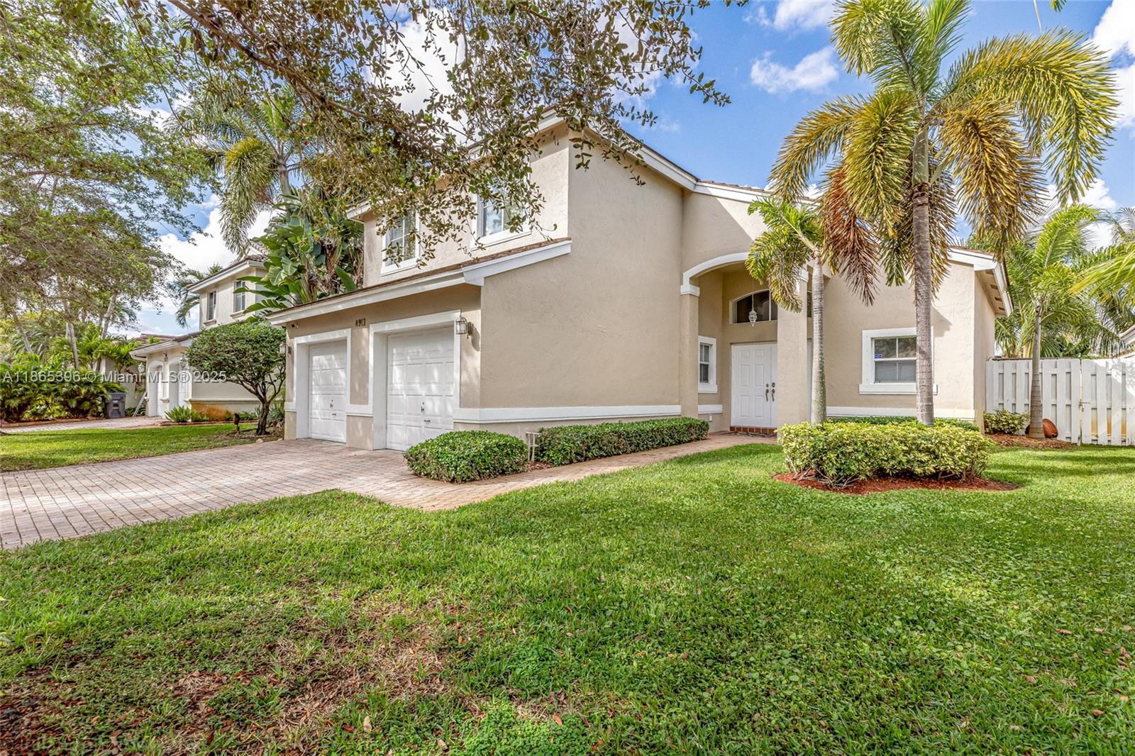 4913 Southwest 32nd Way Hollywood, FL 33312 - Photo 2 of 27 front view of a house with a yard