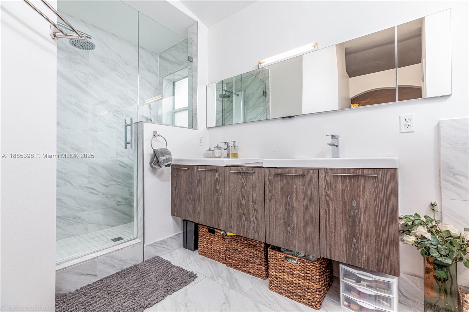 4913 Southwest 32nd Way Hollywood, FL 33312 - Photo 26 of 27 a bathroom with a sink and a mirror