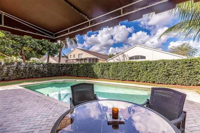 a outdoor view with a swimming pool