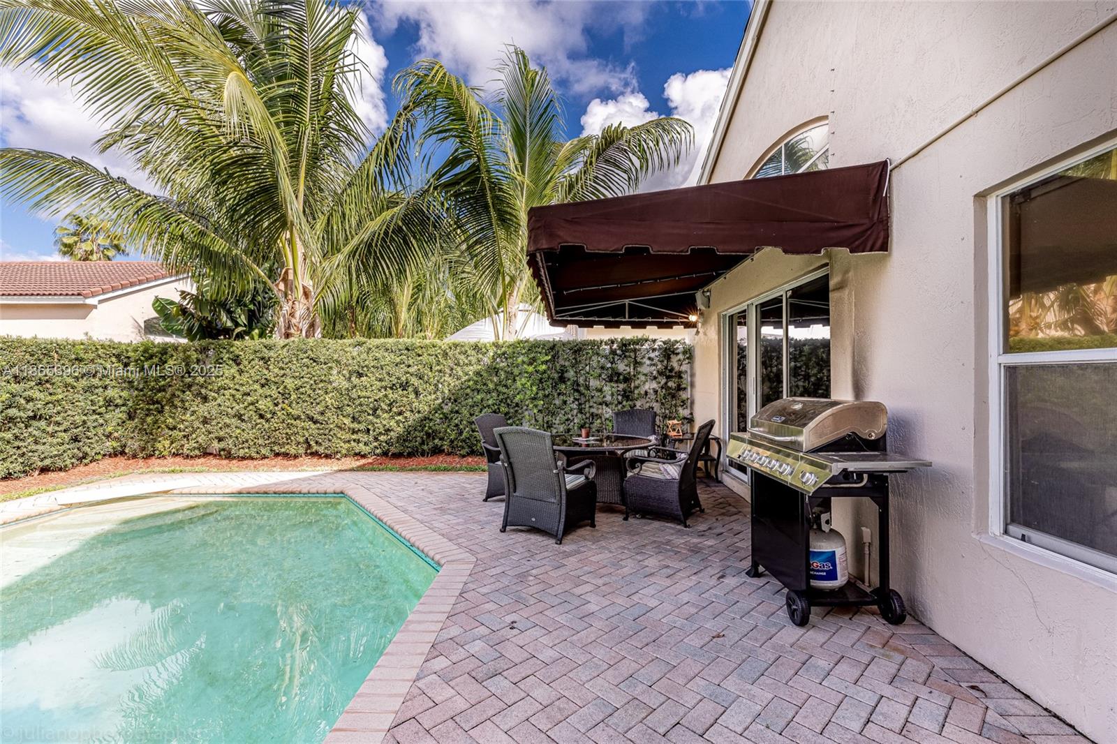 4913 Southwest 32nd Way Hollywood, FL 33312 - Photo 7 of 27 a living room filled with furniture