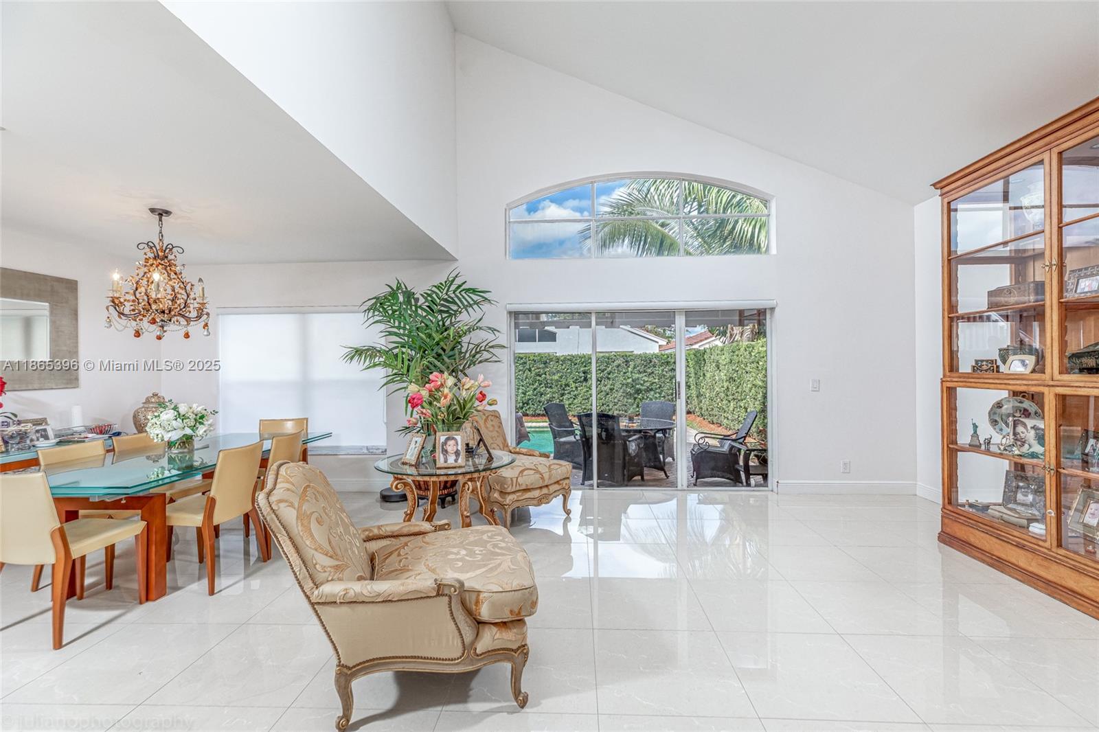 4913 Southwest 32nd Way Hollywood, FL 33312 - Photo 8 of 27 a living room with fireplace furniture and a large window