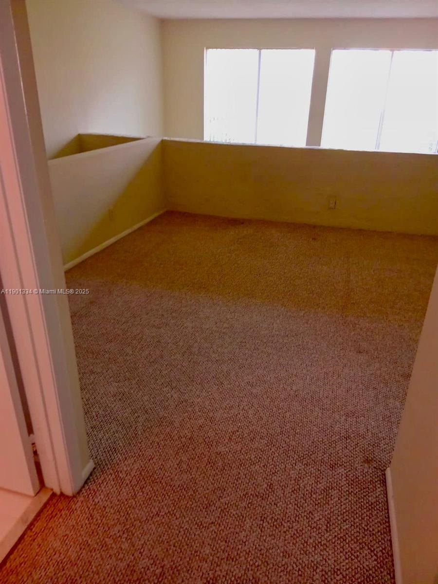 18051 Northwest 68th Avenue, Unit J102 Hialeah, FL 33015 - Photo 6 of 15