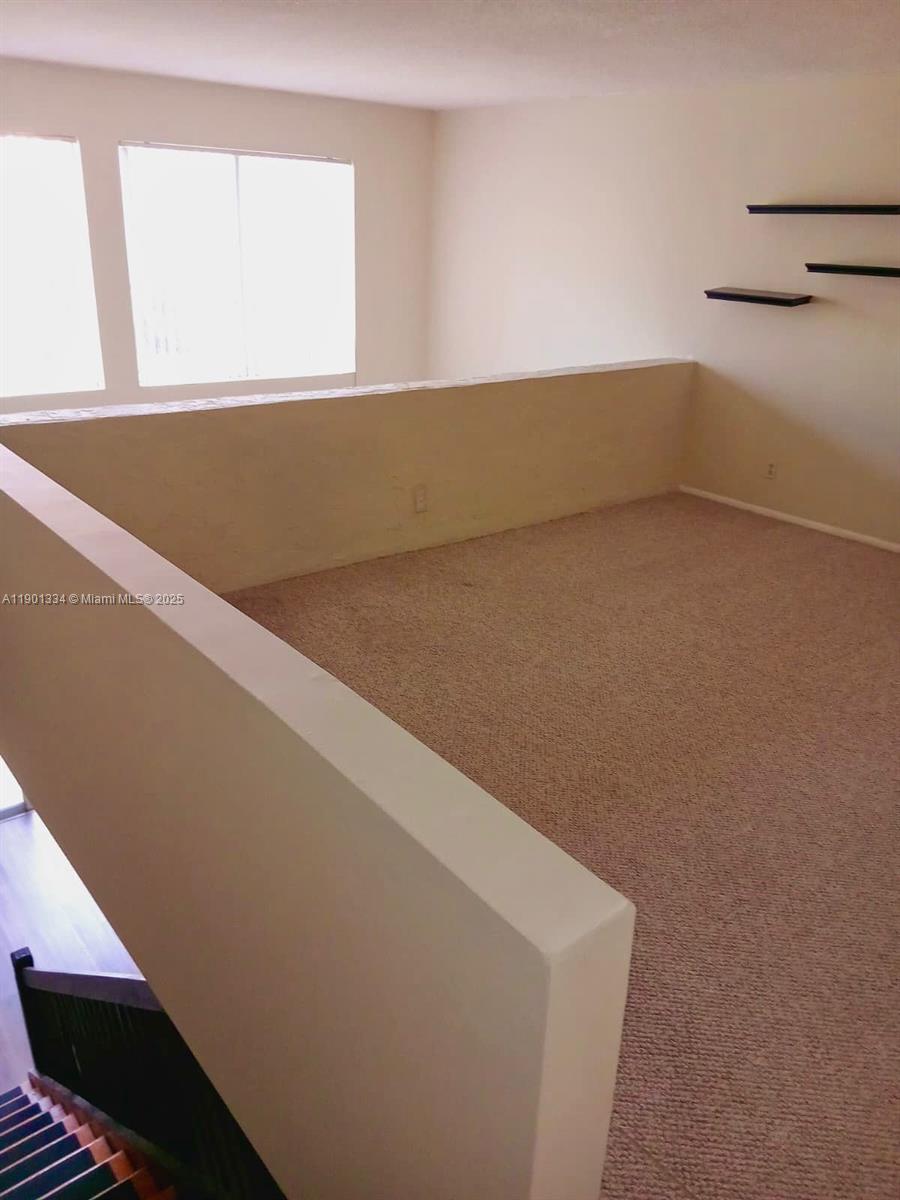 18051 Northwest 68th Avenue, Unit J102 Hialeah, FL 33015 - Photo 7 of 15 a view of room