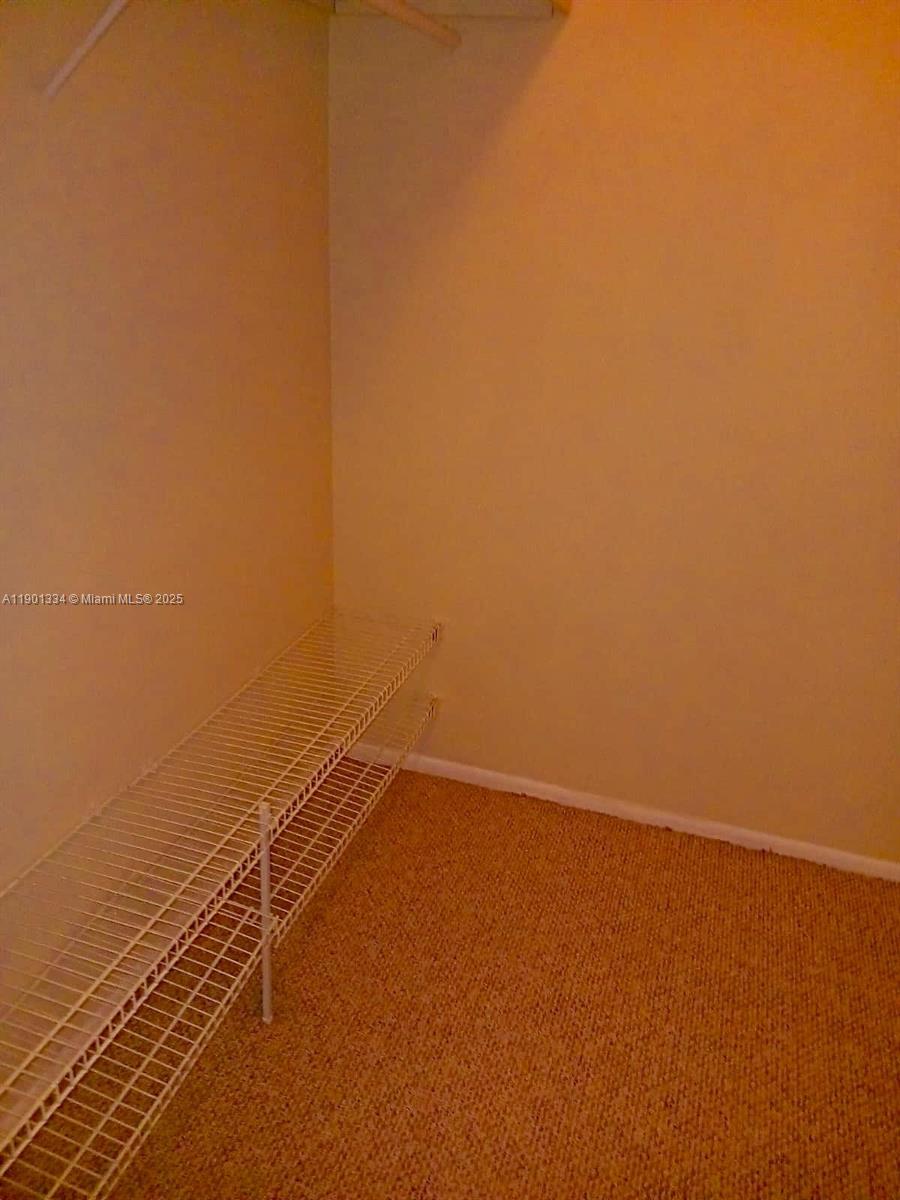 18051 Northwest 68th Avenue, Unit J102 Hialeah, FL 33015 - Photo 10 of 15 a view of a room with an ocean view