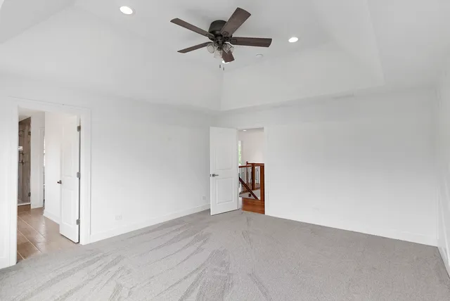 a bathroom with a shower and a sink