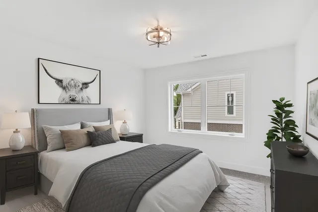a view of room with a ceiling fan