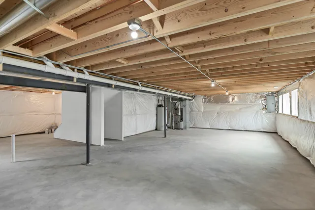 a view of balcony with wooden floor and fence