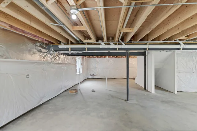 a view of a chair and table in the yard