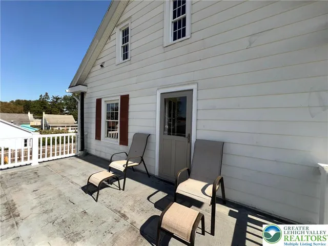 a view of gallery with wooden floor