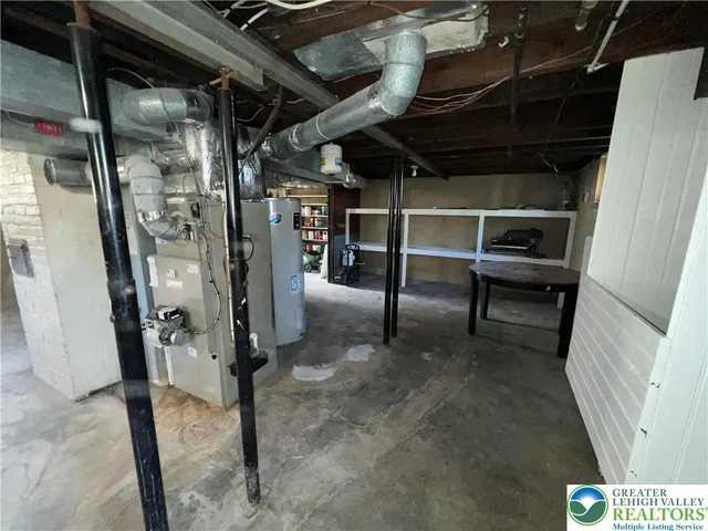 a view of house with backyard