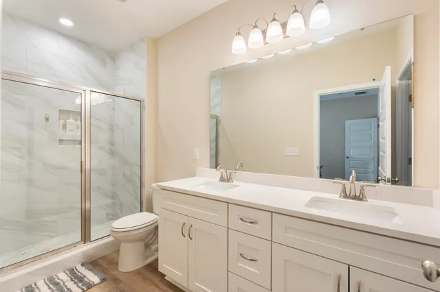 a bedroom with a bed and furniture