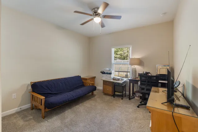 a view of room with flat screen tv cabinet and a flat screen tv