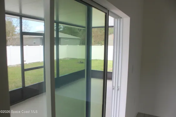 a bathroom with a glass door
