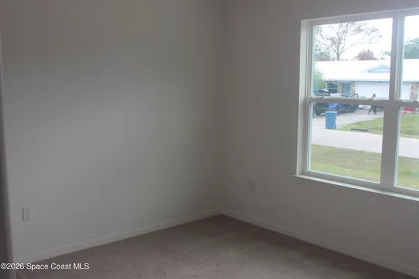 an empty room with a window