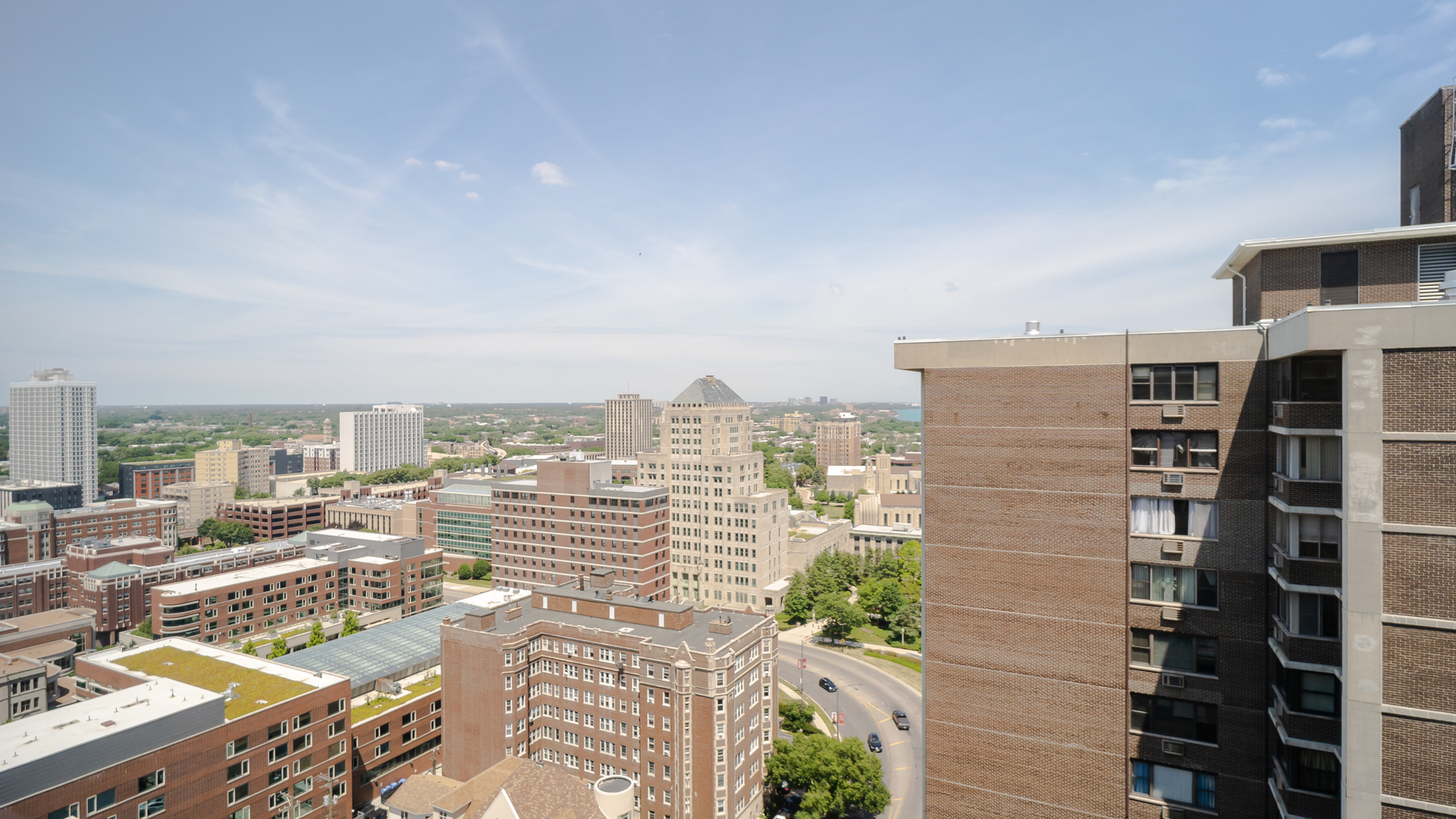6301 North Sheridan Road, Unit 22B Chicago, IL 60660 - Photo 12 of 14 a view of a city with tall buildings