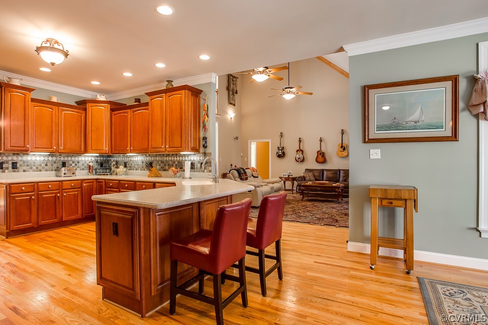 17507 Old Ridge Road Montpelier, VA 23192 - Photo 3 of 50 a kitchen with stainless steel appliances granite countertop a table chairs and a refrigerator