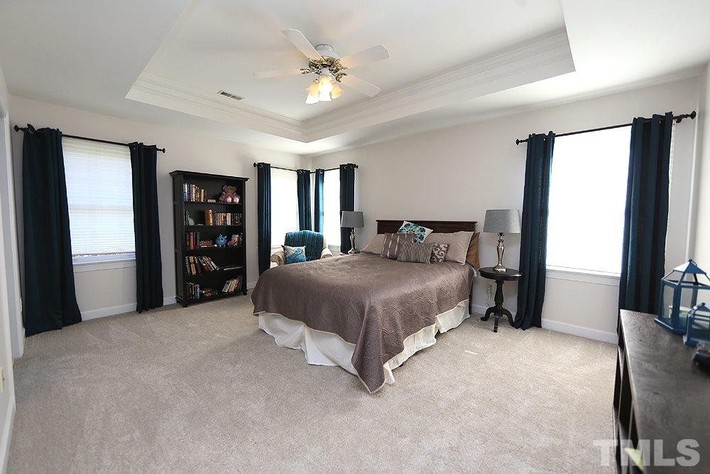 5628 Raddington Street Raleigh, NC 27613 - Photo 14 of 25 Tray ceiling in master bedroom.