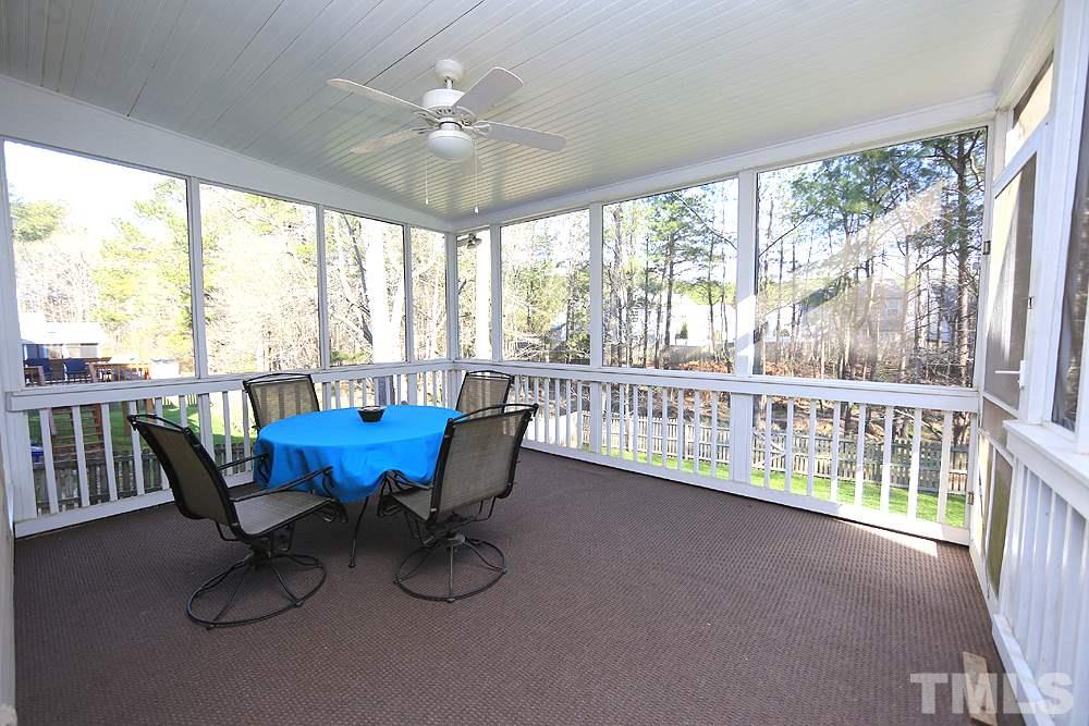 5628 Raddington Street Raleigh, NC 27613 - Photo 23 of 25 Delightful screened in porch overlooking private backyard.