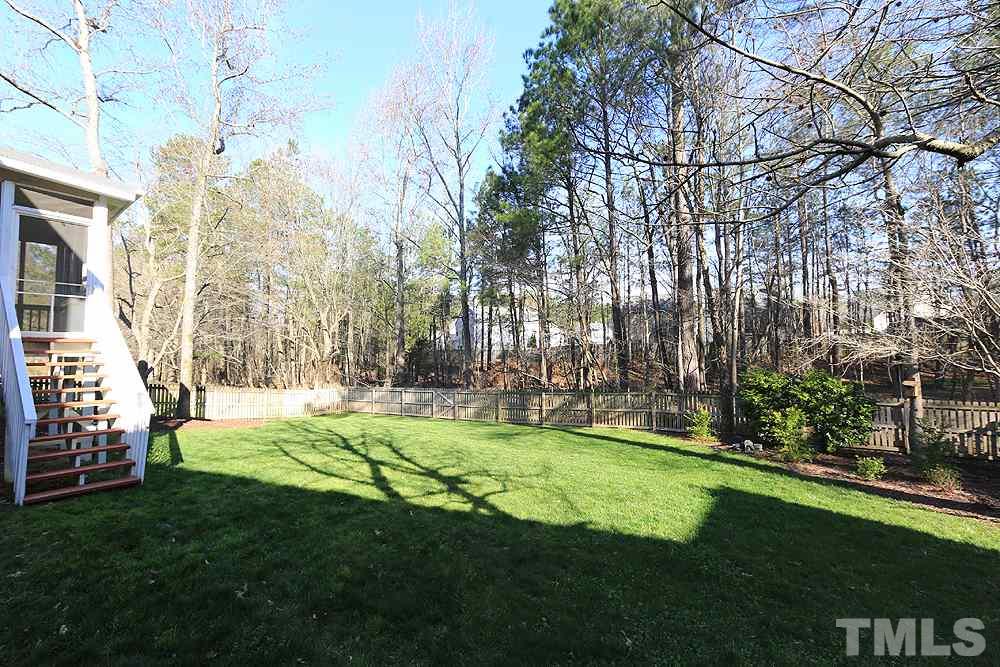 5628 Raddington Street Raleigh, NC 27613 - Photo 24 of 25 Fenced in yard adjoining to HOA greenway.