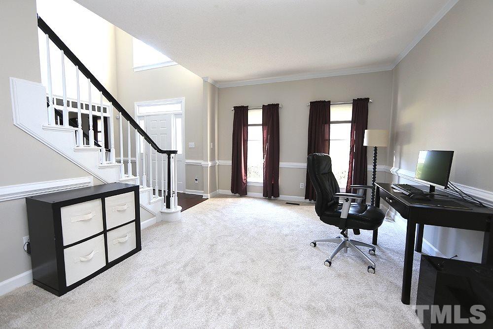 5628 Raddington Street Raleigh, NC 27613 - Photo 6 of 25 Crown molding and chair rail.