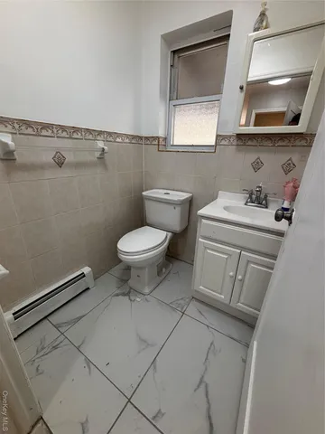 a view of a utility room with washer and dryer