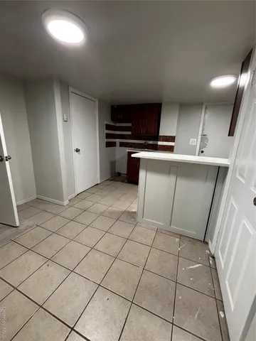 a view of storage and utility room