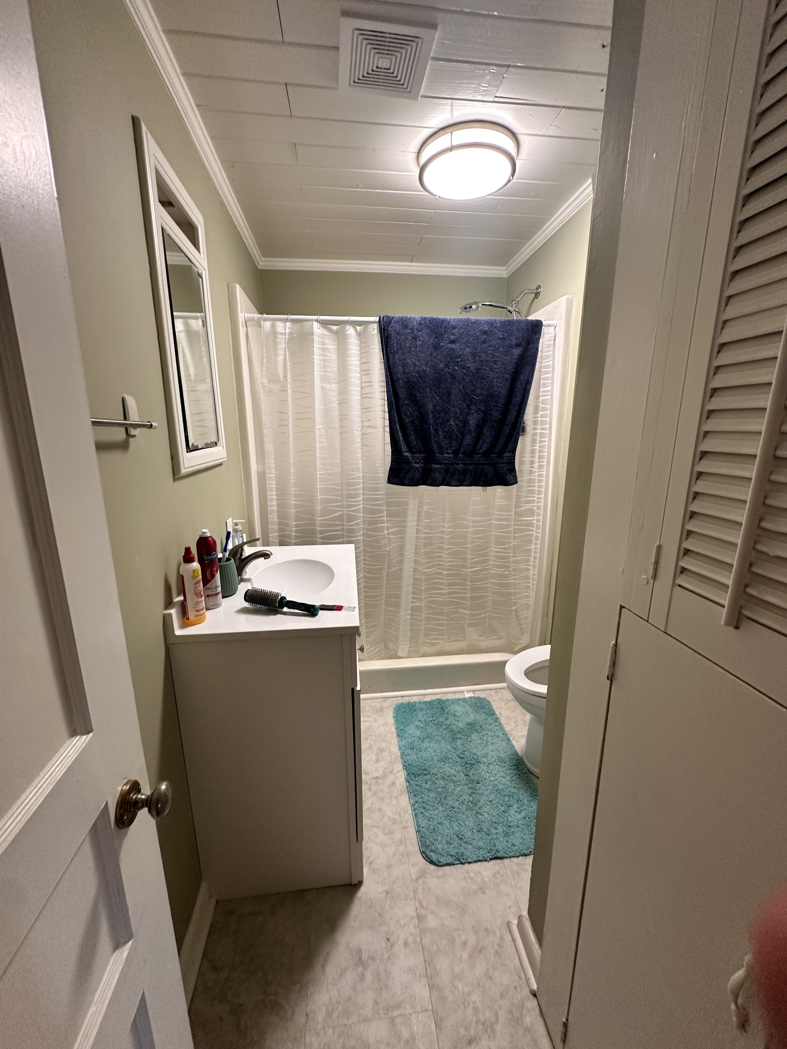 426 Frank Street Lawrenceburg, TN 38464 - Photo 12 of 17 a bathroom with a sink and mirror