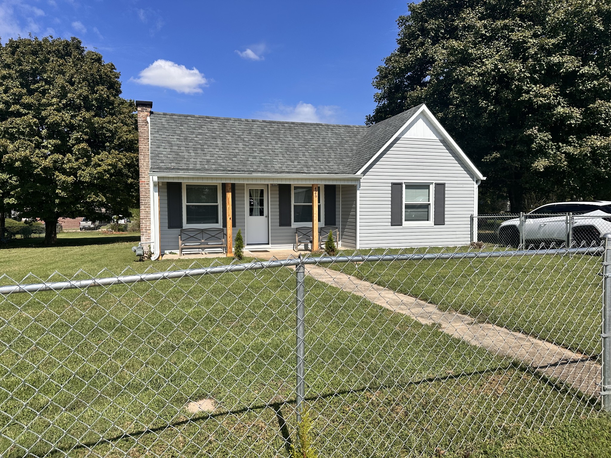 426 Frank Street Lawrenceburg, TN 38464 - Photo 16 of 17 a view of a house with a backyard