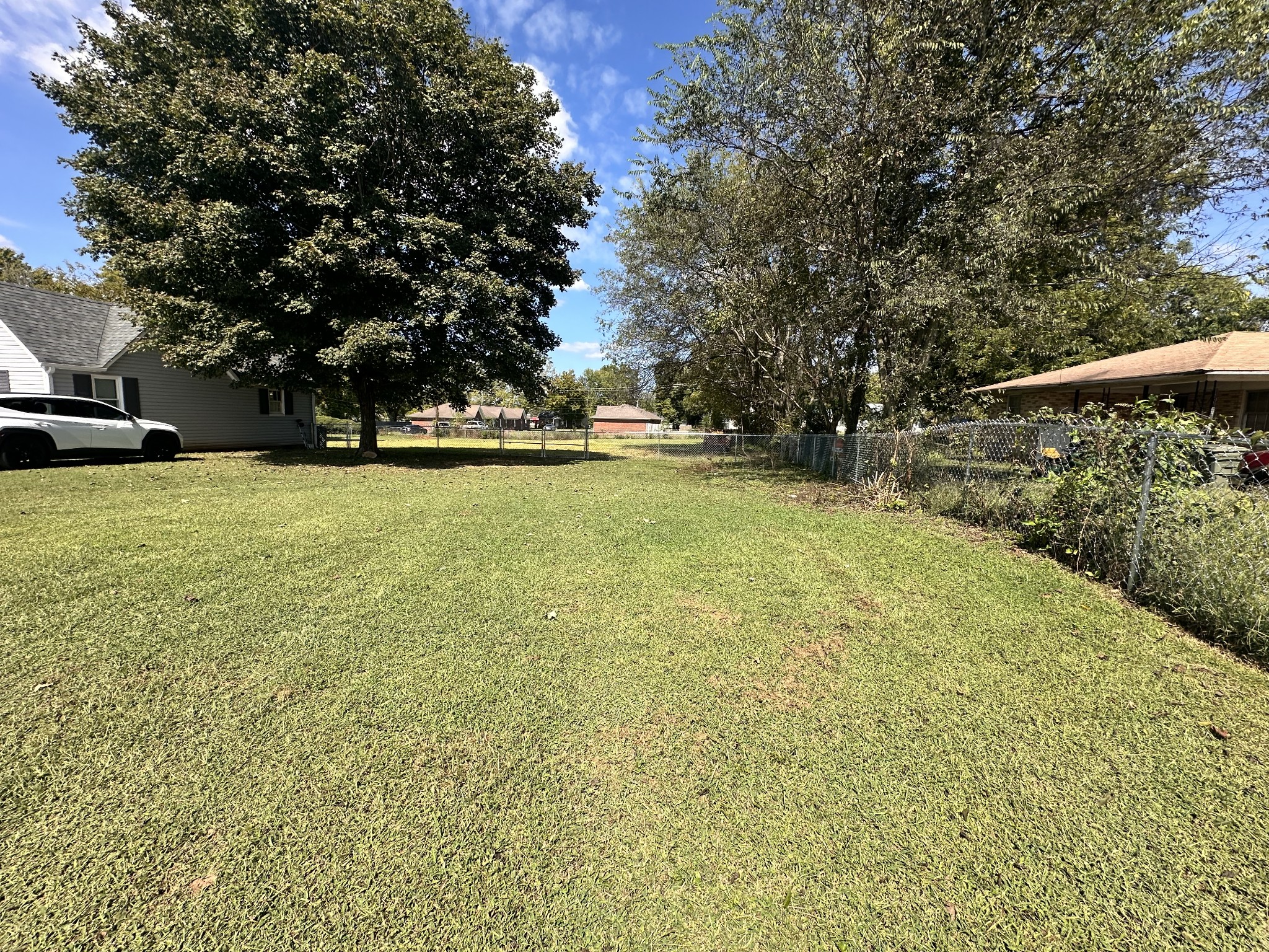 426 Frank Street Lawrenceburg, TN 38464 - Photo 17 of 17 a view of yard with swimming pool and trees