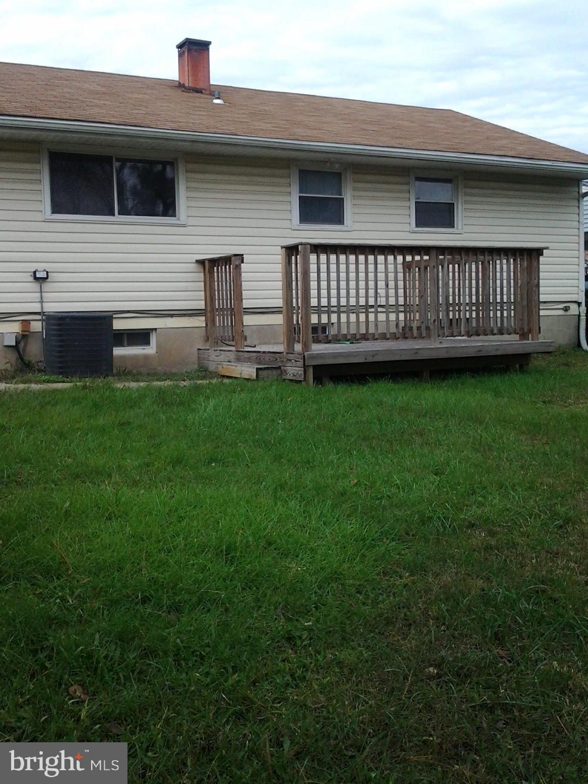 3113 Rheims Road Baltimore, MD 21244 - Photo 2 of 16 a view of backyard with deck